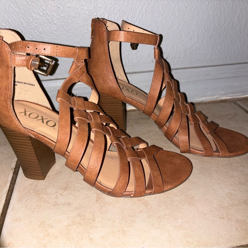 Woman’s tan heels